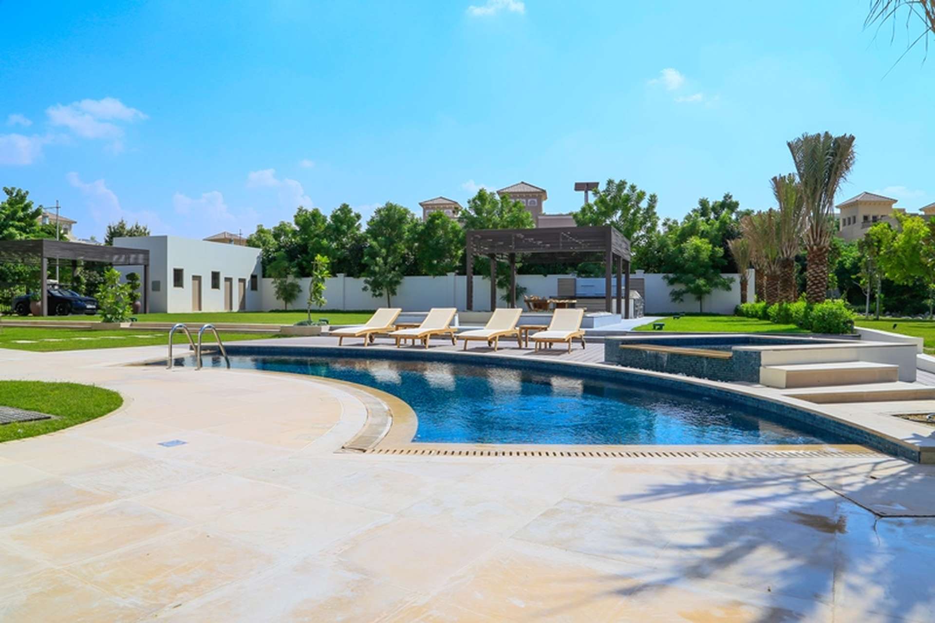 Luxurious villa with outdoor kitchen and garden in Ajman Uptown, perfect for entertaining
