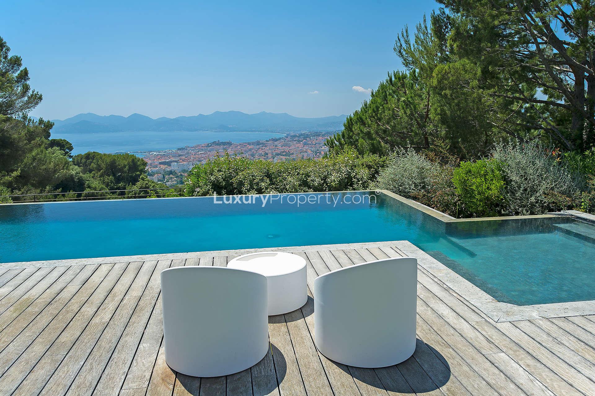 Modern dining area with sea view in Cannes Californie villa, French Riviera