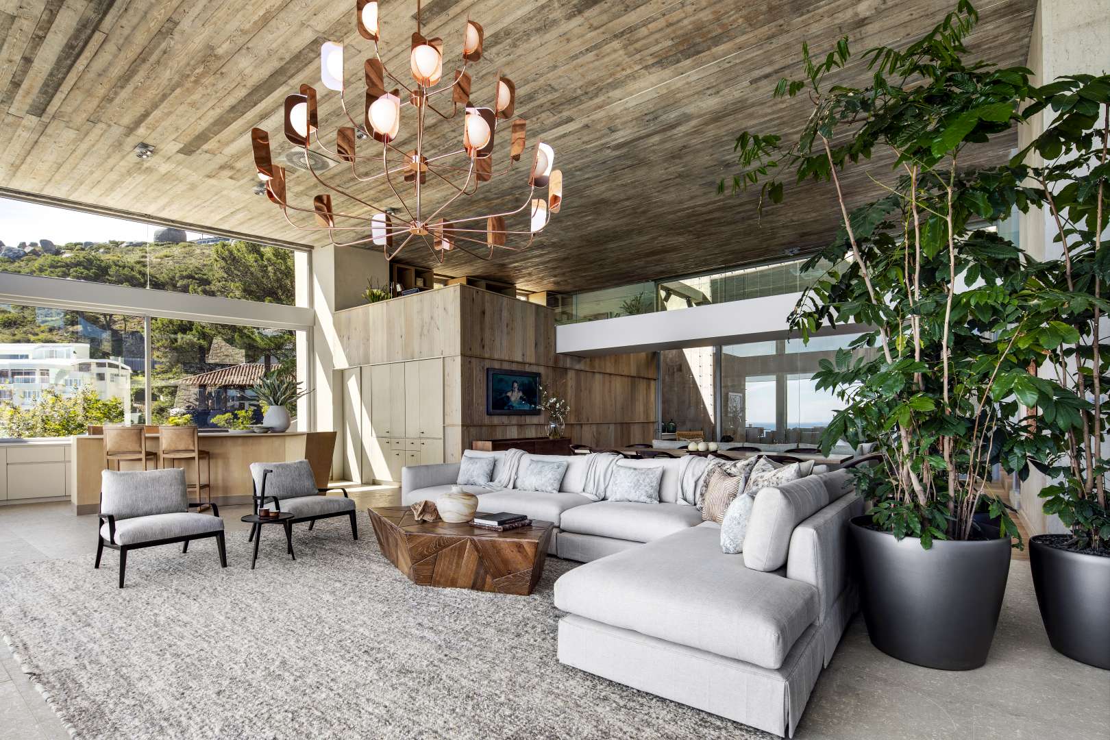 Luxurious Clifton villa living room with ocean view, modern decor, and spacious design