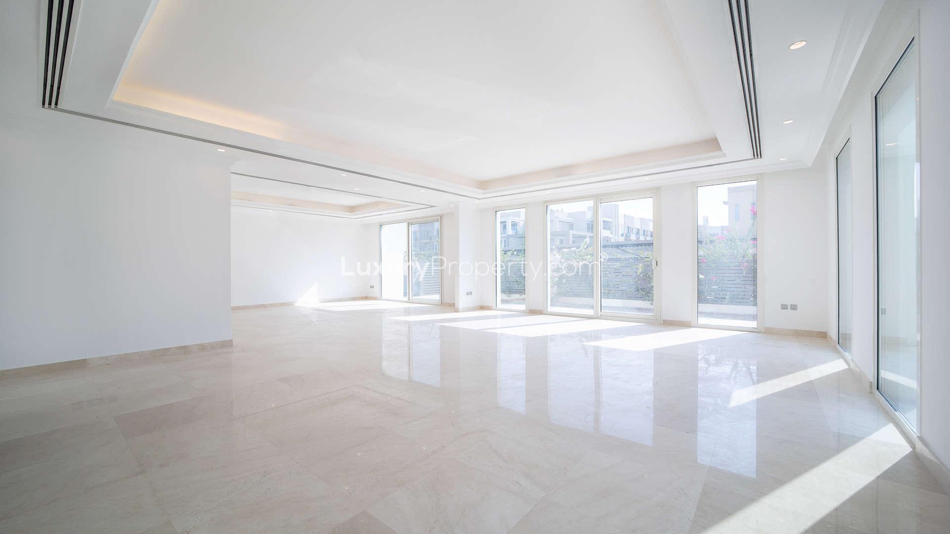 5-Bedroom Villa for Sale in The Sustainable City, Dubailand - Exterior View,Spacious living area in 5-bedroom villa, The Sustainable City, Dubailand, large windows, bright interior