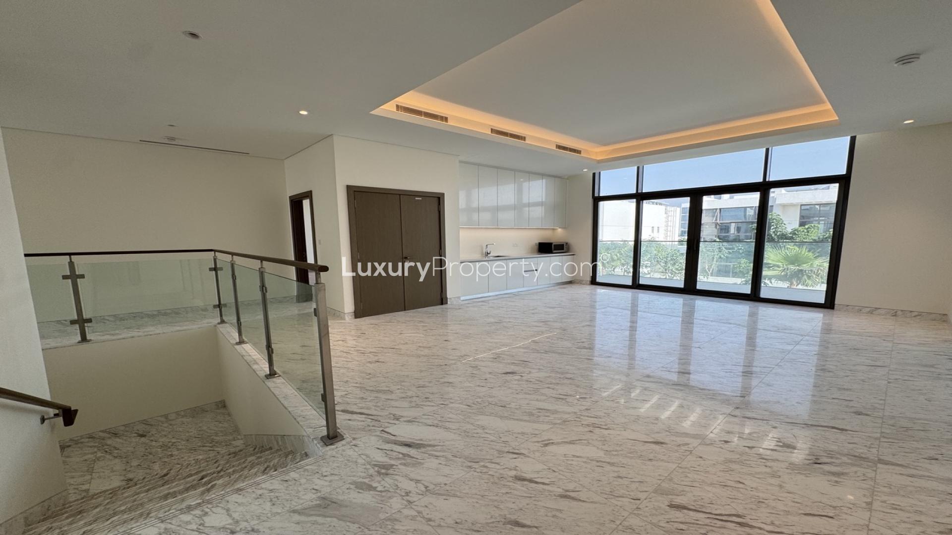 Spacious living area with marble floors in District One villa, MBR City, Dubai