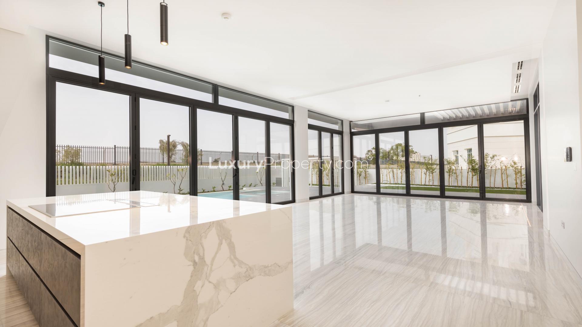 Modern 5-bedroom villa exterior in Dubai Hills Estate, featuring sleek design and gated entry