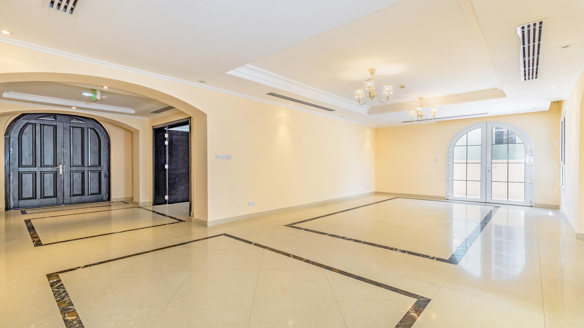 Spacious villa interior with elegant arches and large windows, Jumeirah Golf Estates, Earth