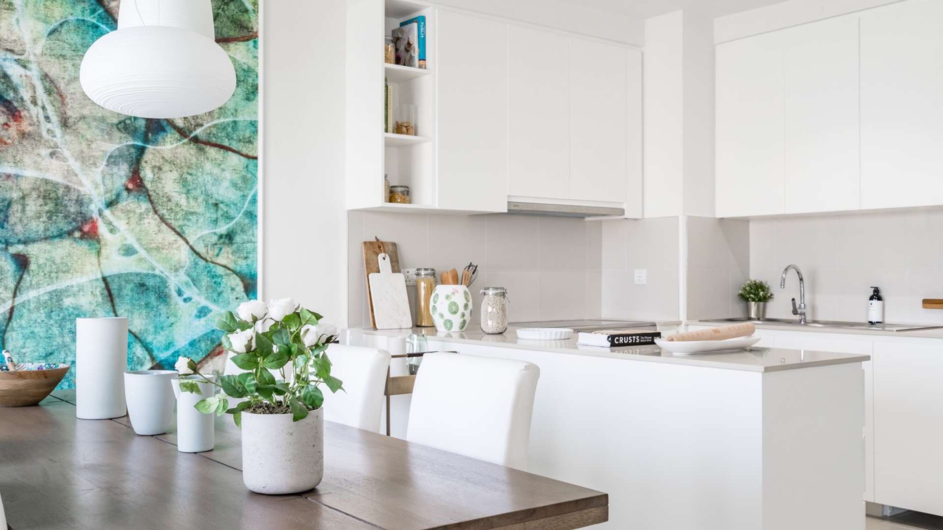 Modern kitchen in luxurious 5-bedroom villa, Emaar South Golf Links, featuring elegant decor