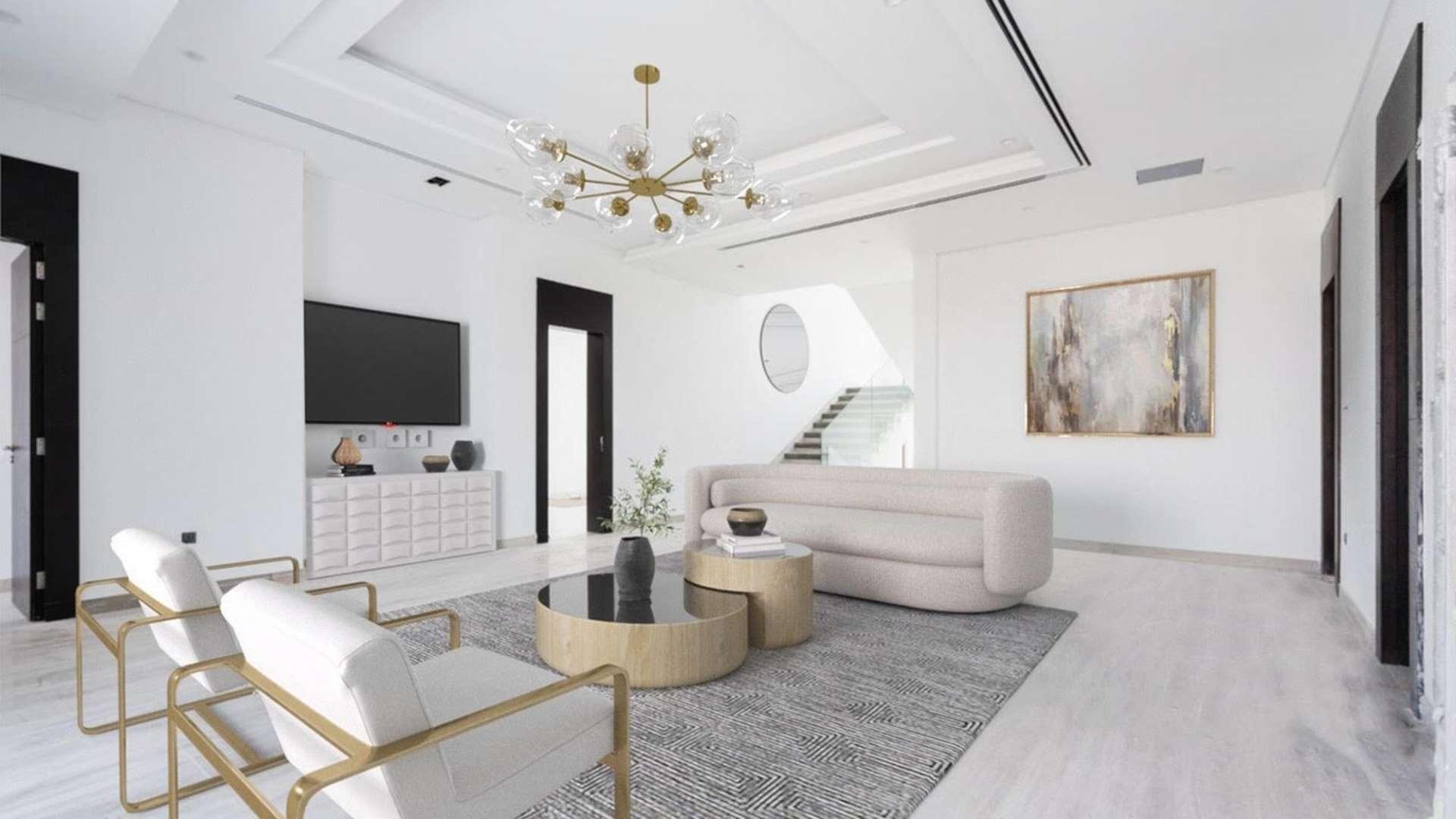 Modern living room in Dubai Hills Estate villa, featuring elegant furniture and contemporary decor