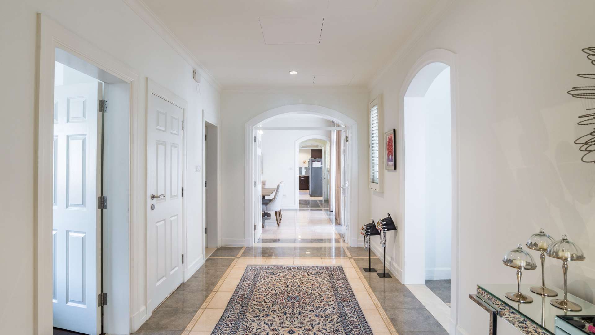 Luxurious villa view, serene lake and lush greenery in Jumeirah Golf Estates, Sienna Lakes