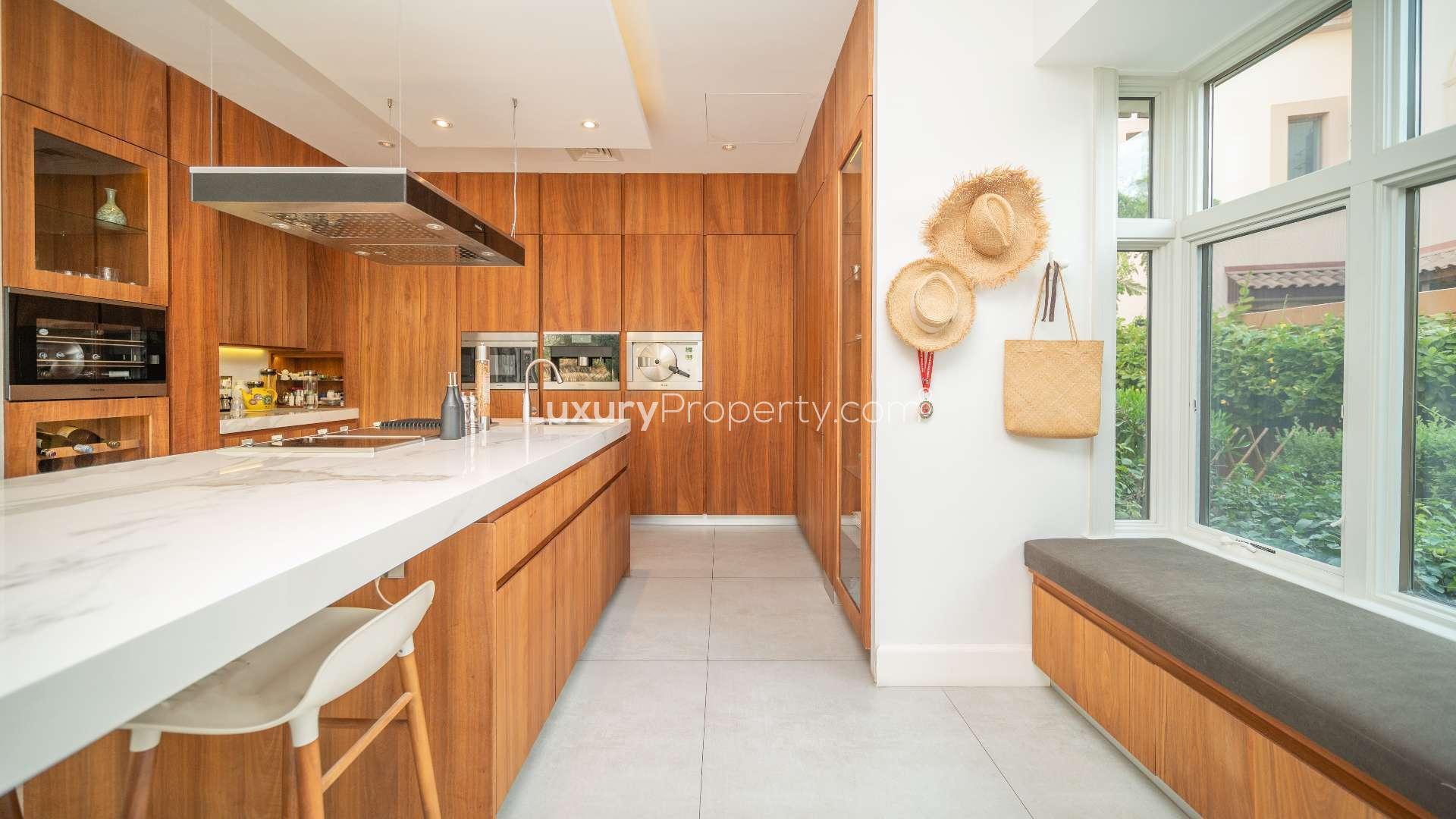 Spacious, upgraded villa interior with modern decor at Jumeirah Golf Estates, Fire community