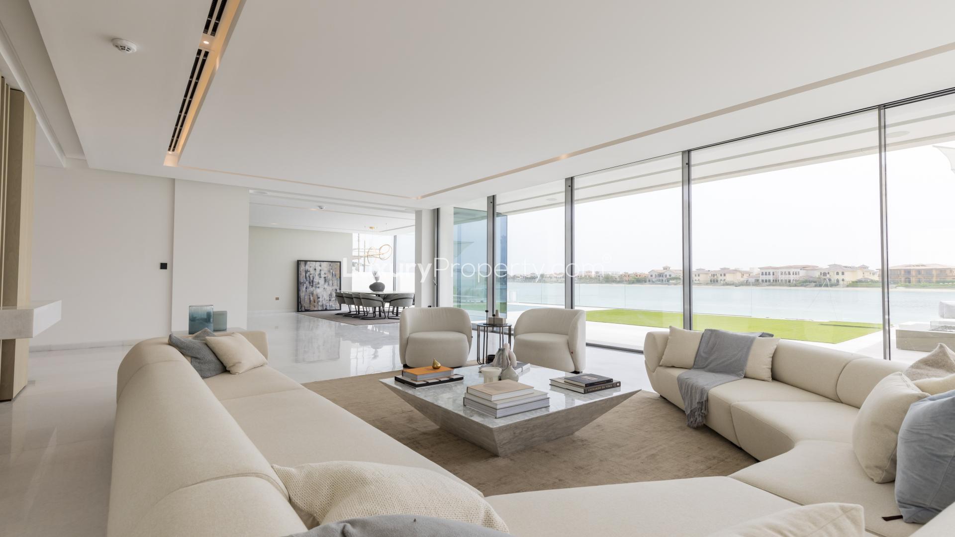 Contemporary beachfront villa exterior with lawn, Palm Jumeirah, for sale, five bedrooms
