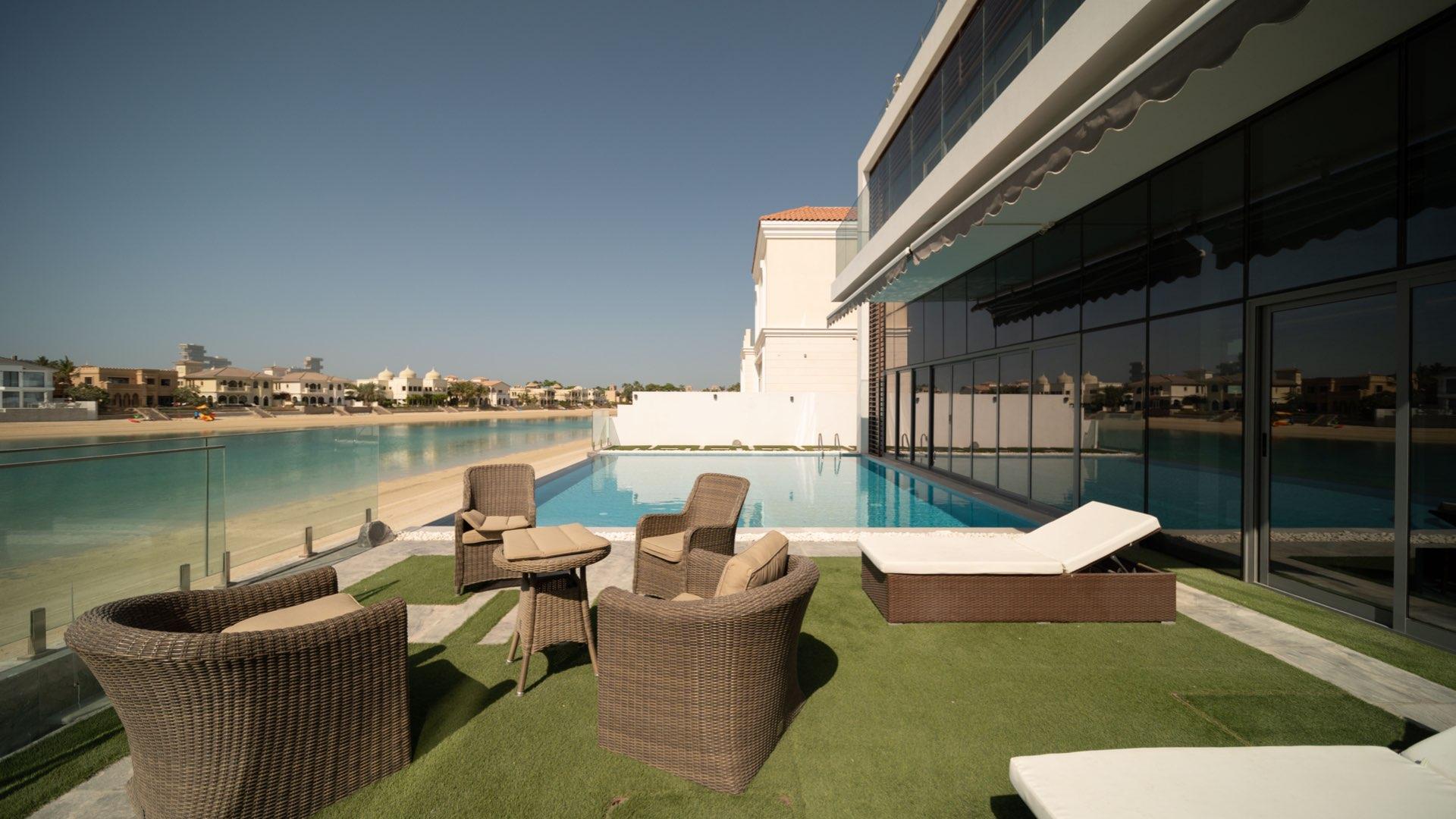 Luxurious Palm Jumeirah villa with private pool and beach views, Garden Homes community