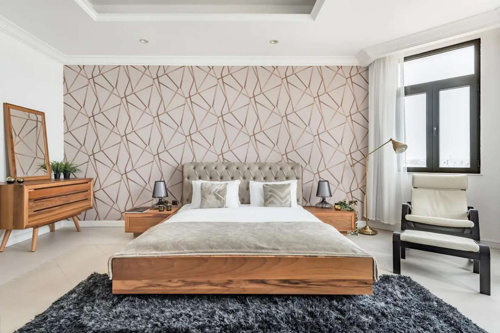 Modern bathroom in Palm Jumeirah Garden Homes villa with tub and stylish fixtures