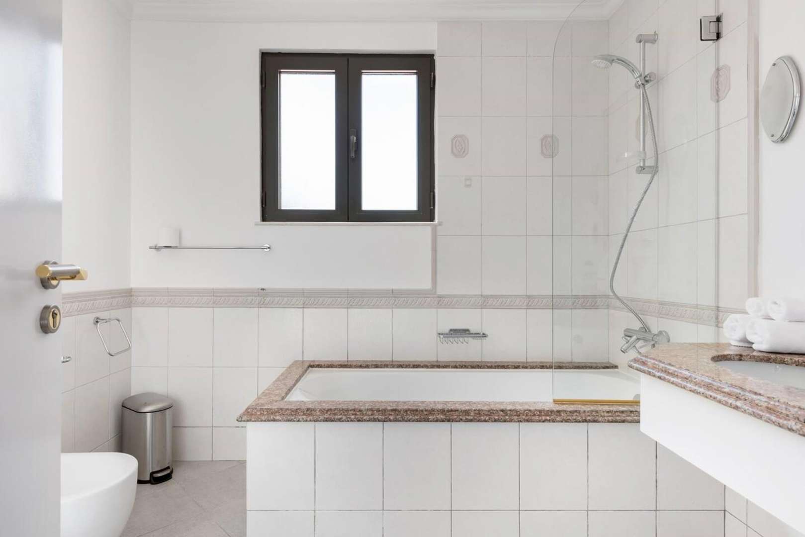 Palm Jumeirah Garden Homes villa exterior with palm trees, double garage, and landscaped driveway