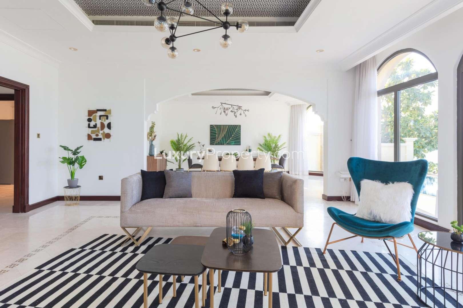 Outdoor seating area of Mediterranean Garden Home on Palm Jumeirah with beach view
