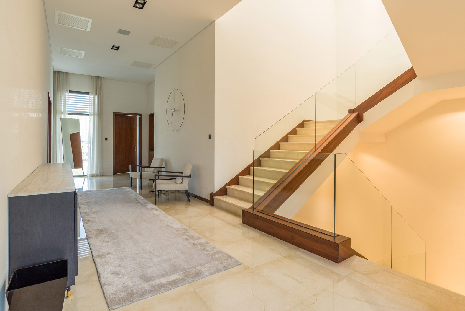 "Luxury villa gym with equipment, Palm Jumeirah, Frond N, 4-bed, Garden Homes, for sale.",Elegant interior of luxury villa with modern staircase and stylish decor, Palm Jumeirah