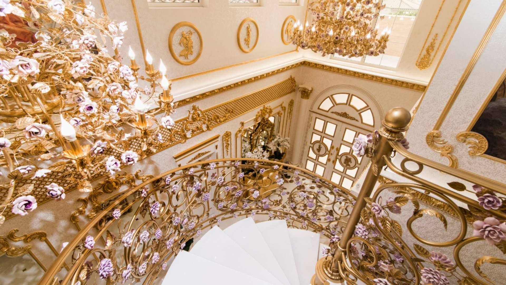 Luxurious master bedroom with ornate gold decor in Palm Jumeirah Garden Home Villa