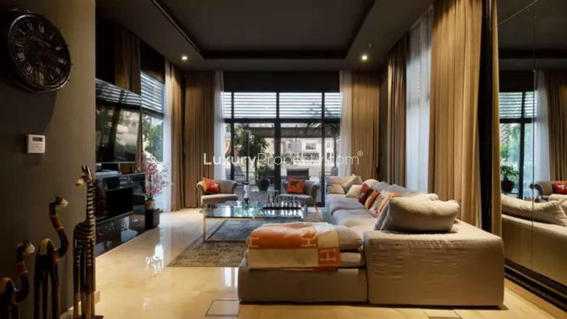 Modern kitchen in 5-bedroom villa, Garden Homes, Palm Jumeirah, with sleek black countertops