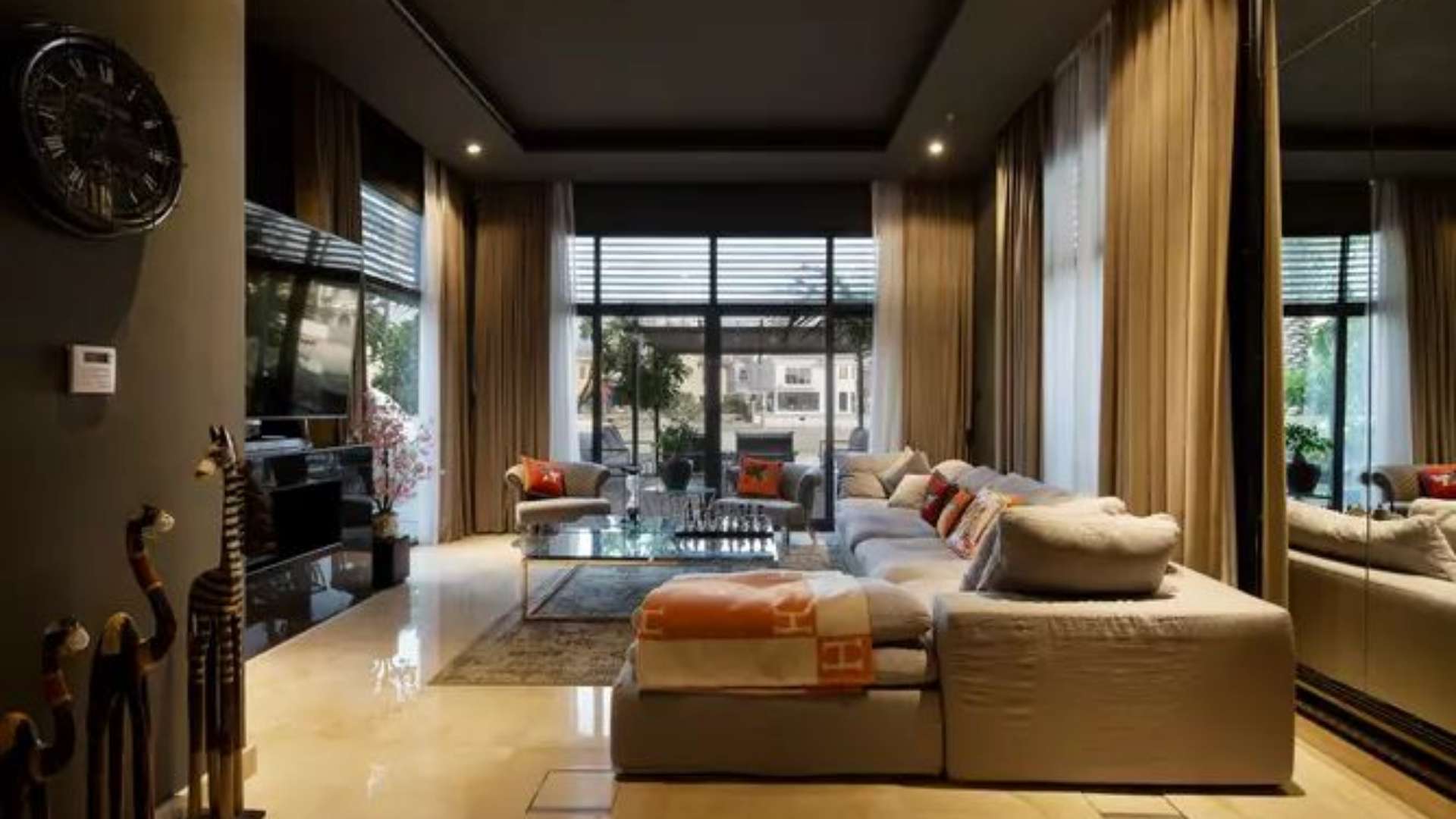 Modern kitchen in 5-bedroom villa, Garden Homes, Palm Jumeirah, with sleek black countertops