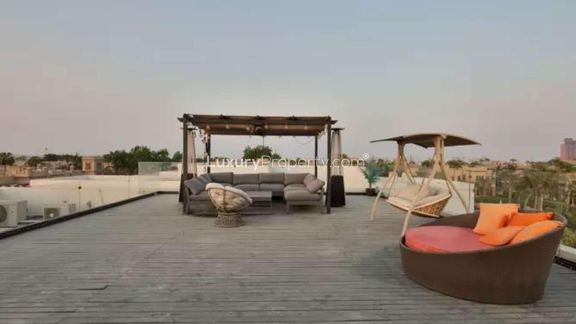 Modern villa exterior with pool, Garden Homes, Palm Jumeirah. 5-bedroom luxury property for sale