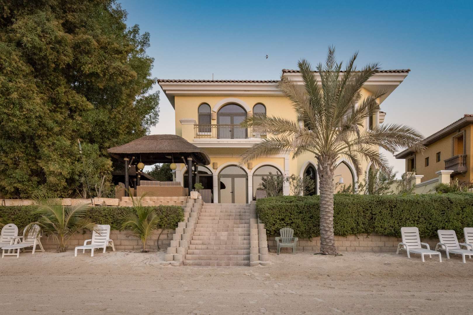 Luxurious Palm Jumeirah villa hallway with modern decor and colorful wall art