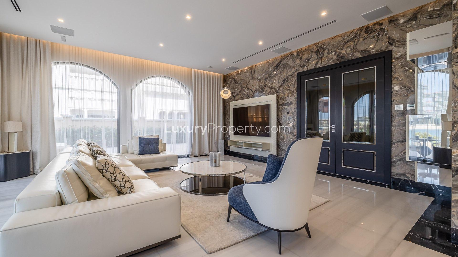 Luxurious living room in renovated Palm Jumeirah villa with stunning waterfront views