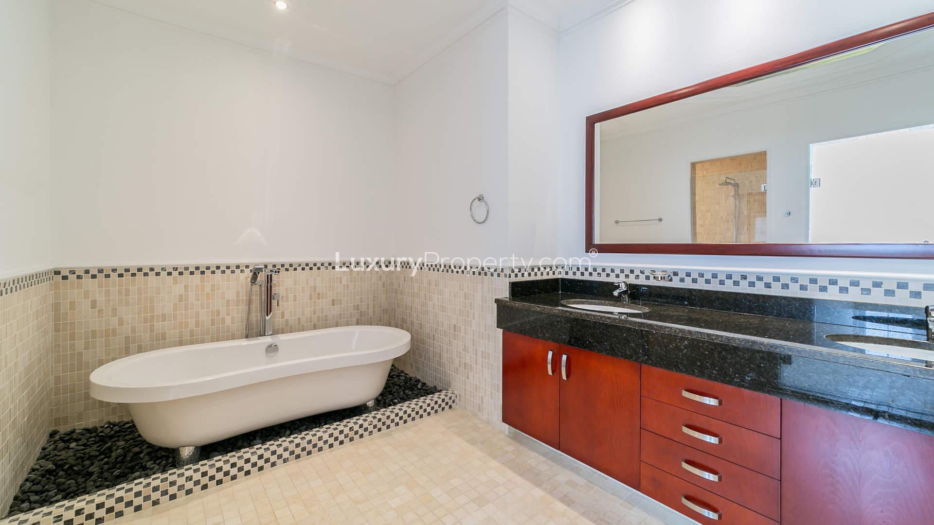 Spacious living room with large windows in Arabian Ranches villa, Golf Course View