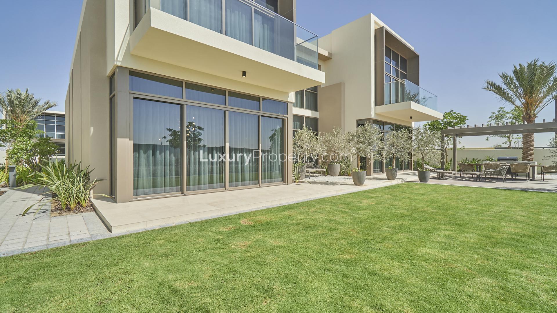 Brand new five-bedroom villa exterior with garden in Golf Place, Dubai Hills Estate