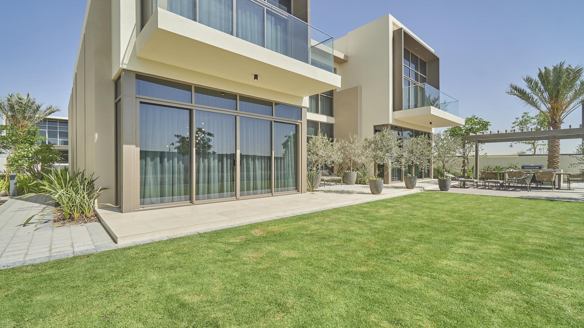 Brand new five-bedroom villa exterior with garden in Golf Place, Dubai Hills Estate