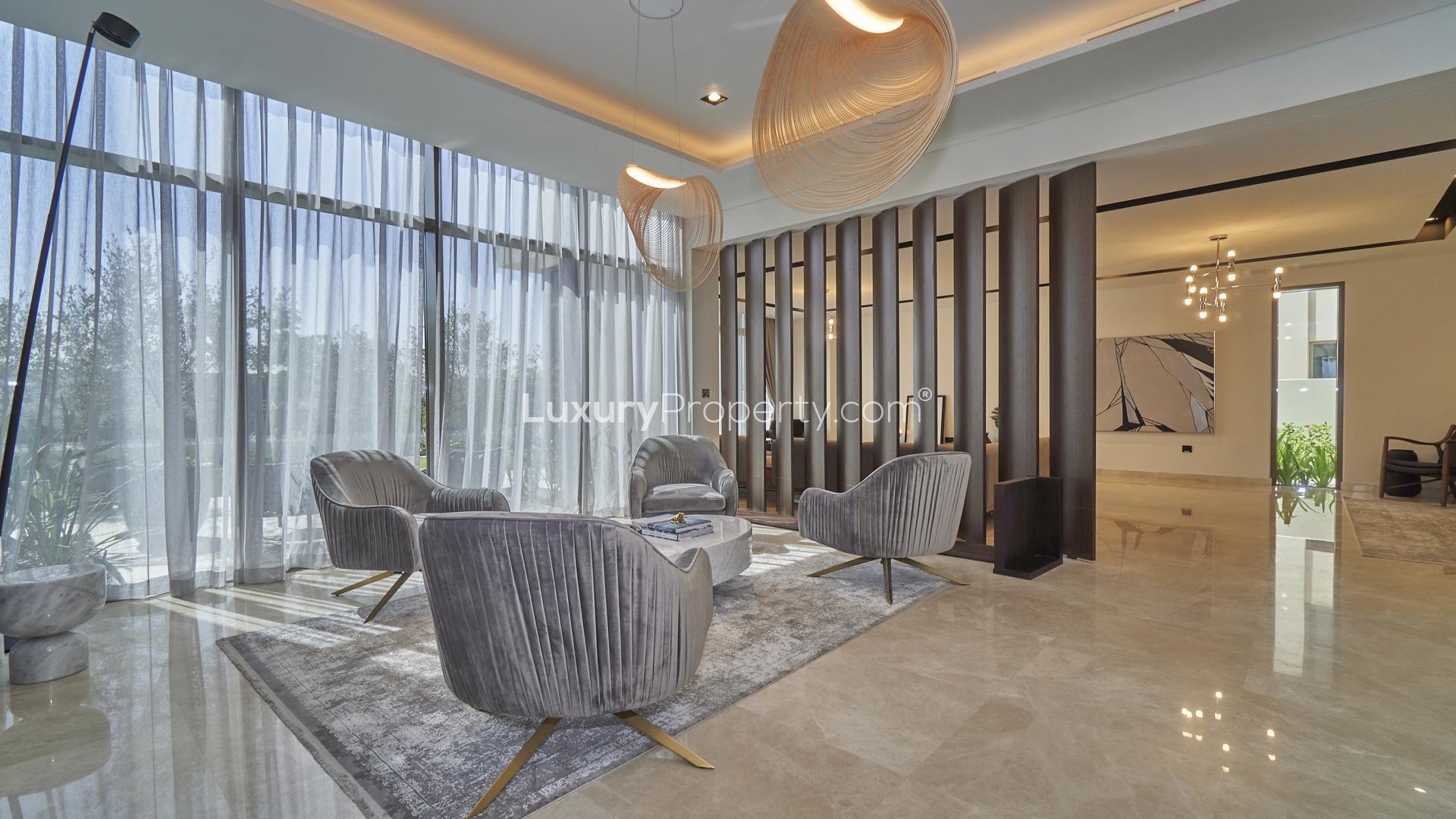 Brand new 5-bedroom villa exterior in Golf Place, Dubai Hills Estate, lush garden view