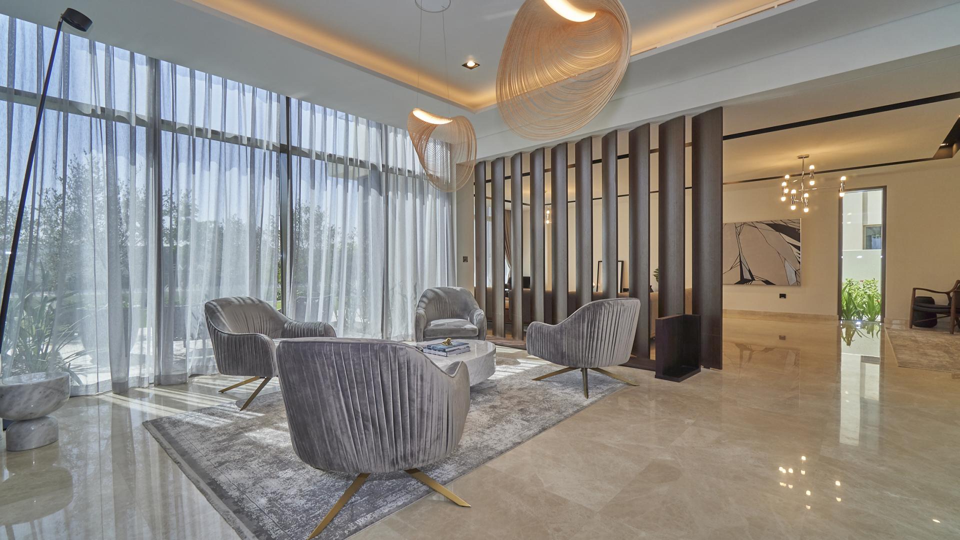 Brand new 5-bedroom villa exterior in Golf Place, Dubai Hills Estate, lush garden view