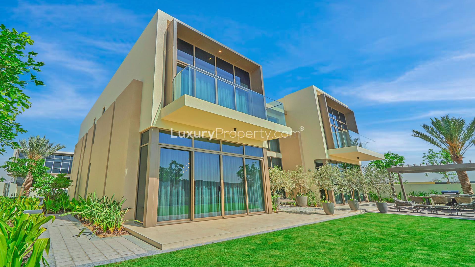 Modern living room in Dubai Hills Estate villa, featuring stylish decor and spacious seating