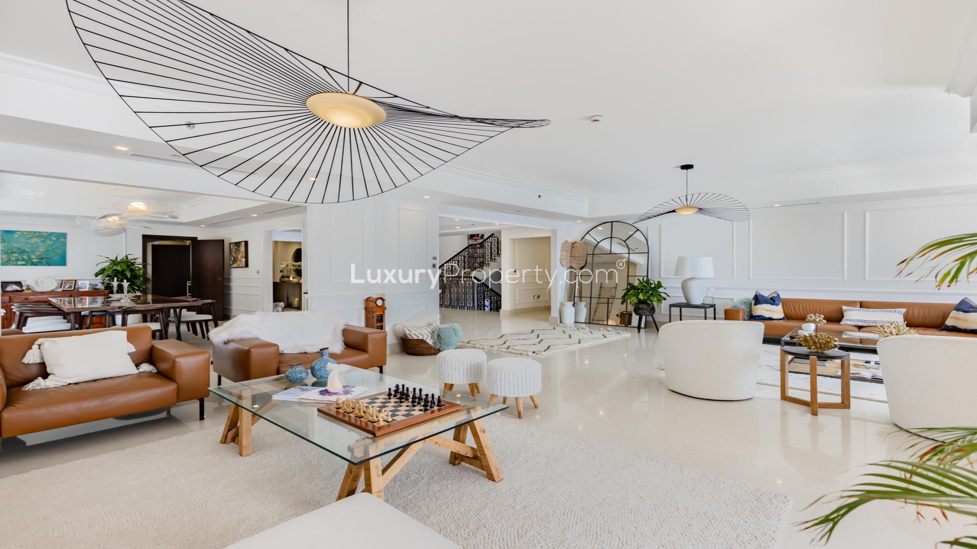 Luxurious living room with waterfront views in Palm Jumeirah villa, Kingdom of Sheba