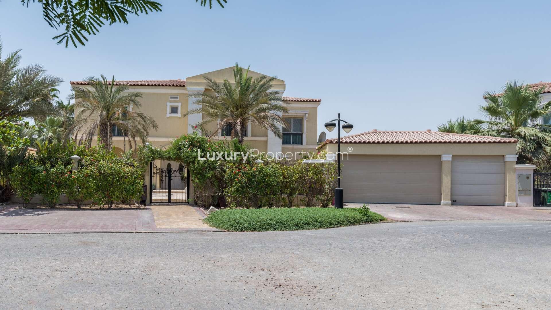 Elegant foyer in luxury villa, Green Community West, featuring ornate decor and vibrant rugs