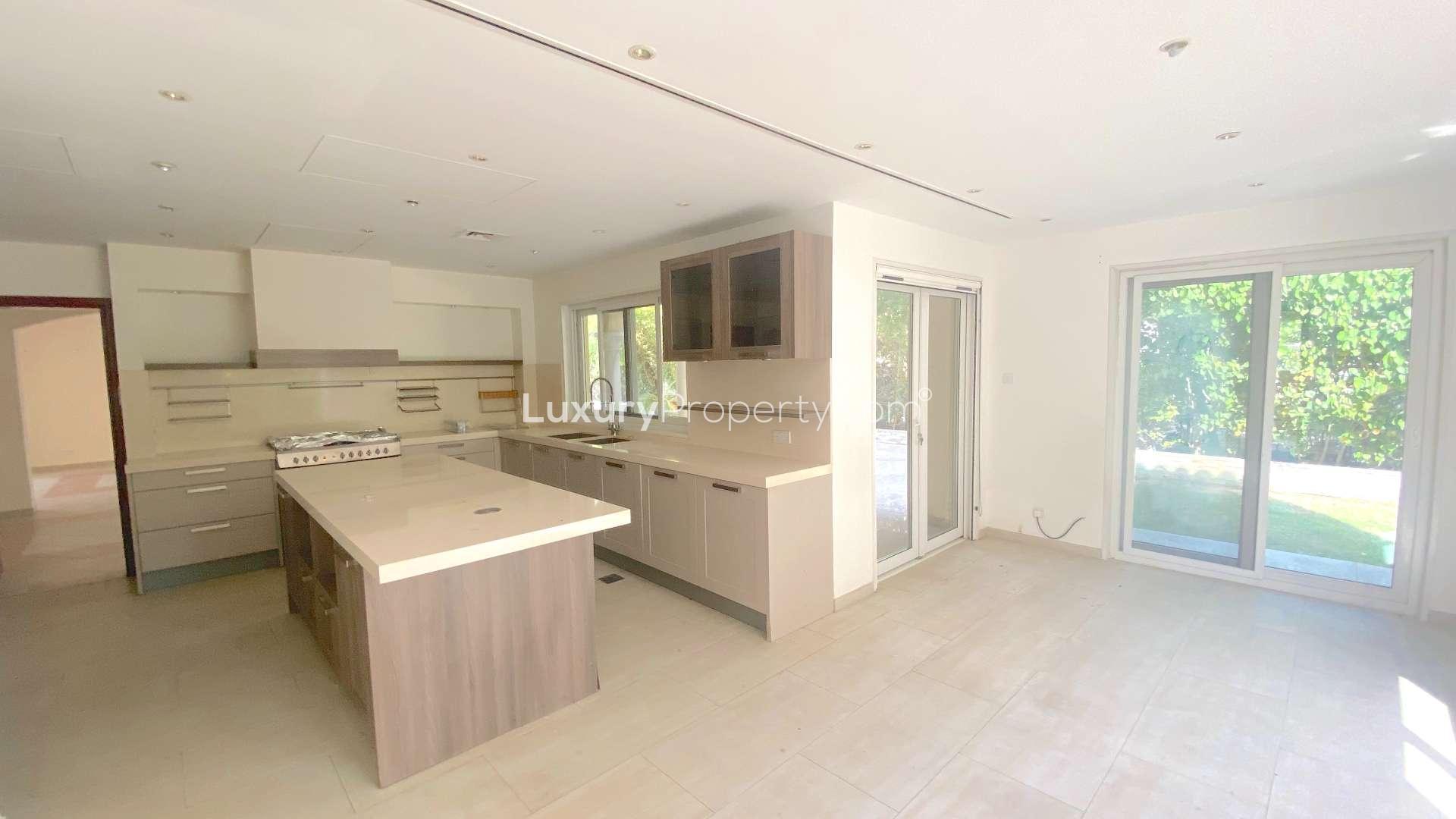 Large villa exterior with palm trees in Green Community West, for sale, Ref LP12107