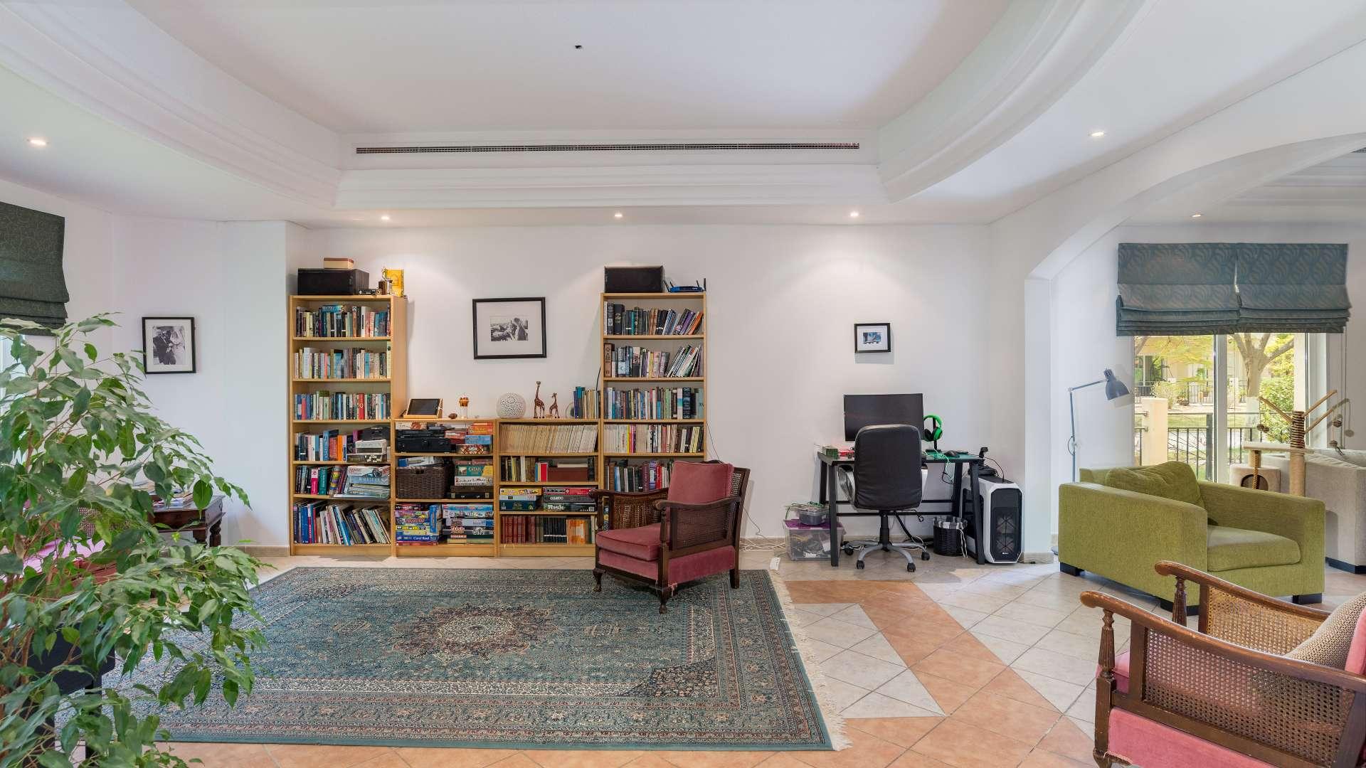 Interior view of spacious villa entrance with elegant decor in Green Community West