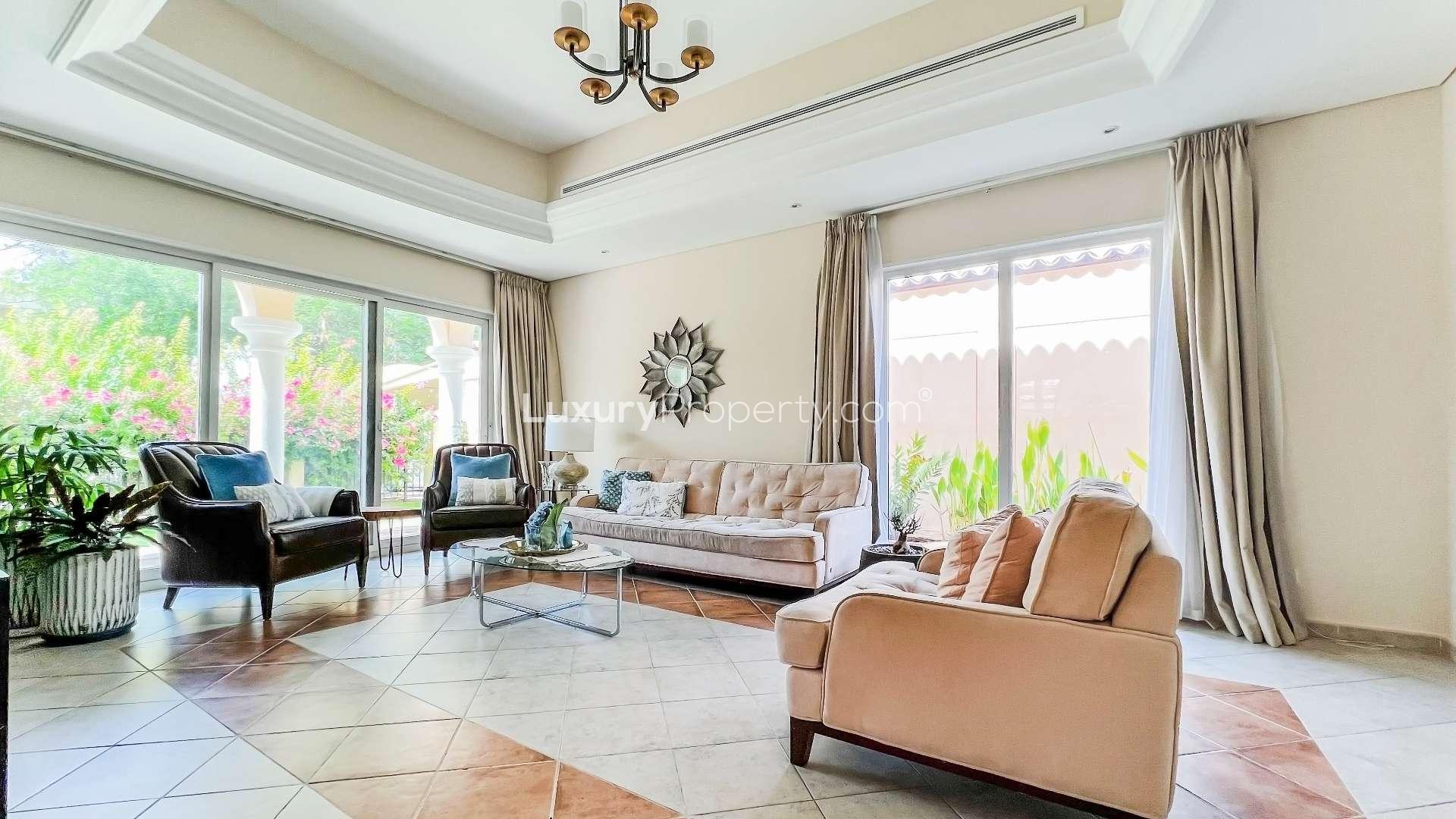 Expansive garden view of 5-bedroom villa in Green Community West, vibrant greenery