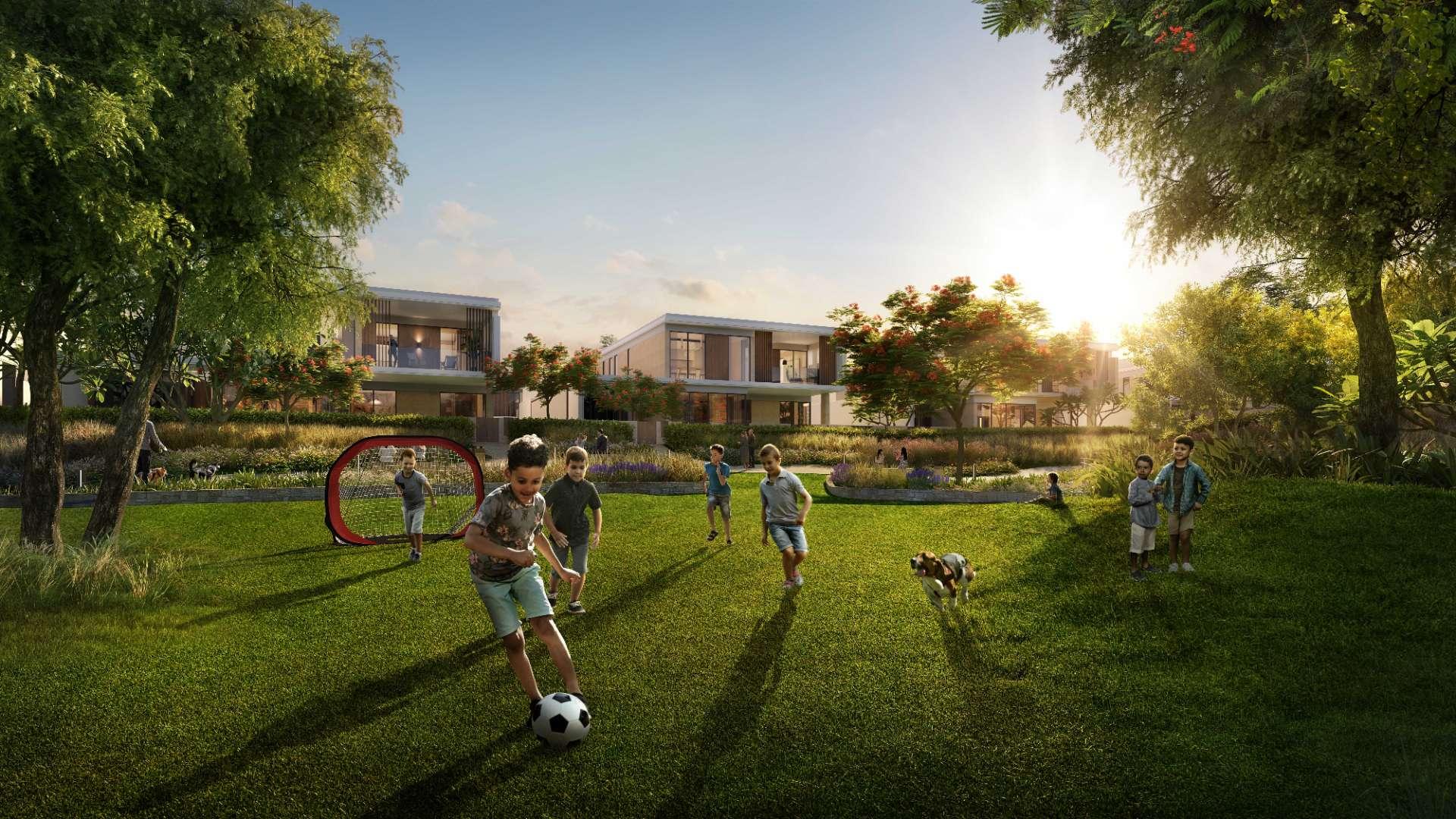 Modern five-bedroom villa exterior in Harmony, Tilal Al Ghaf community, with lush landscaping