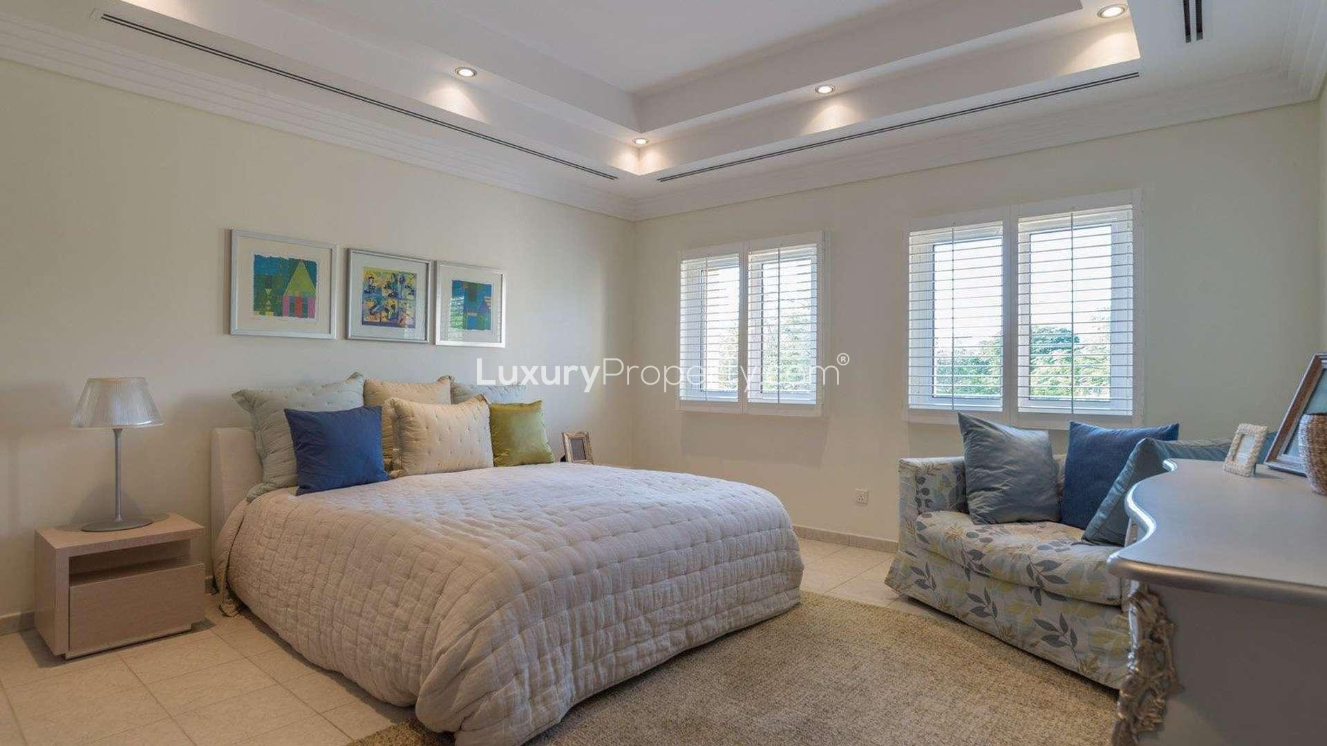 Beautiful 5-bedroom villa exterior in Hattan, The Lakes, surrounded by lush greenery