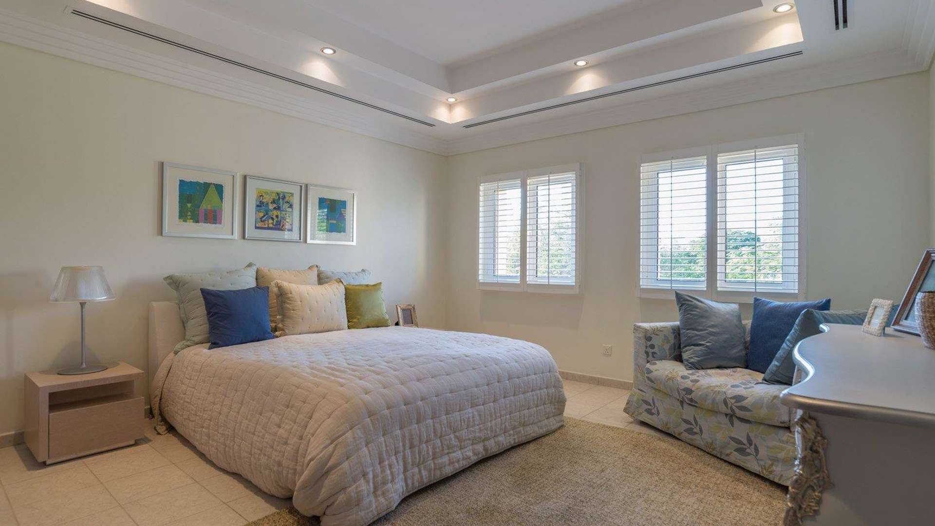 Beautiful 5-bedroom villa exterior in Hattan, The Lakes, surrounded by lush greenery