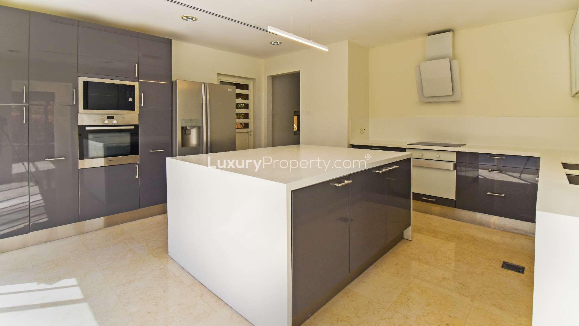 Upgraded 5-bedroom villa exterior with garden and swing in Hattan Executive 2, Dubai