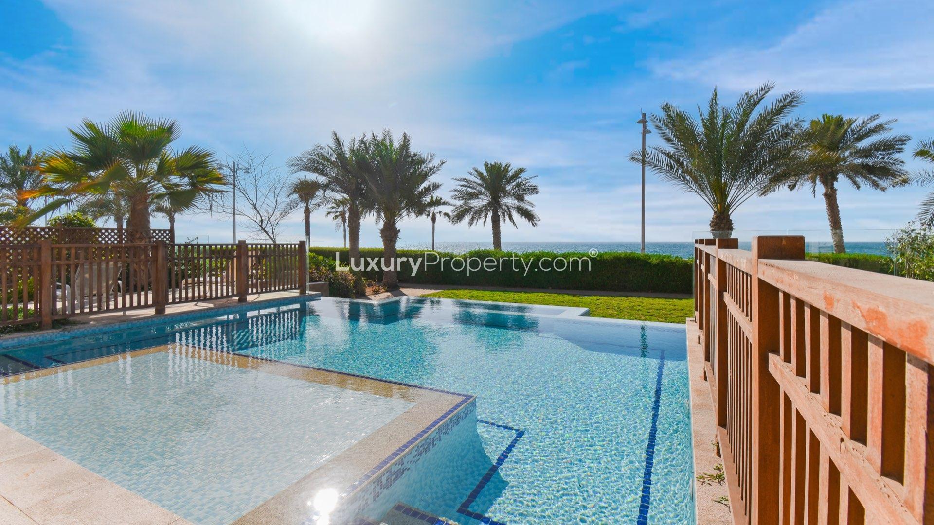Luxurious living room in fully furnished Palm Jumeirah villa, modern decor, spacious seating area