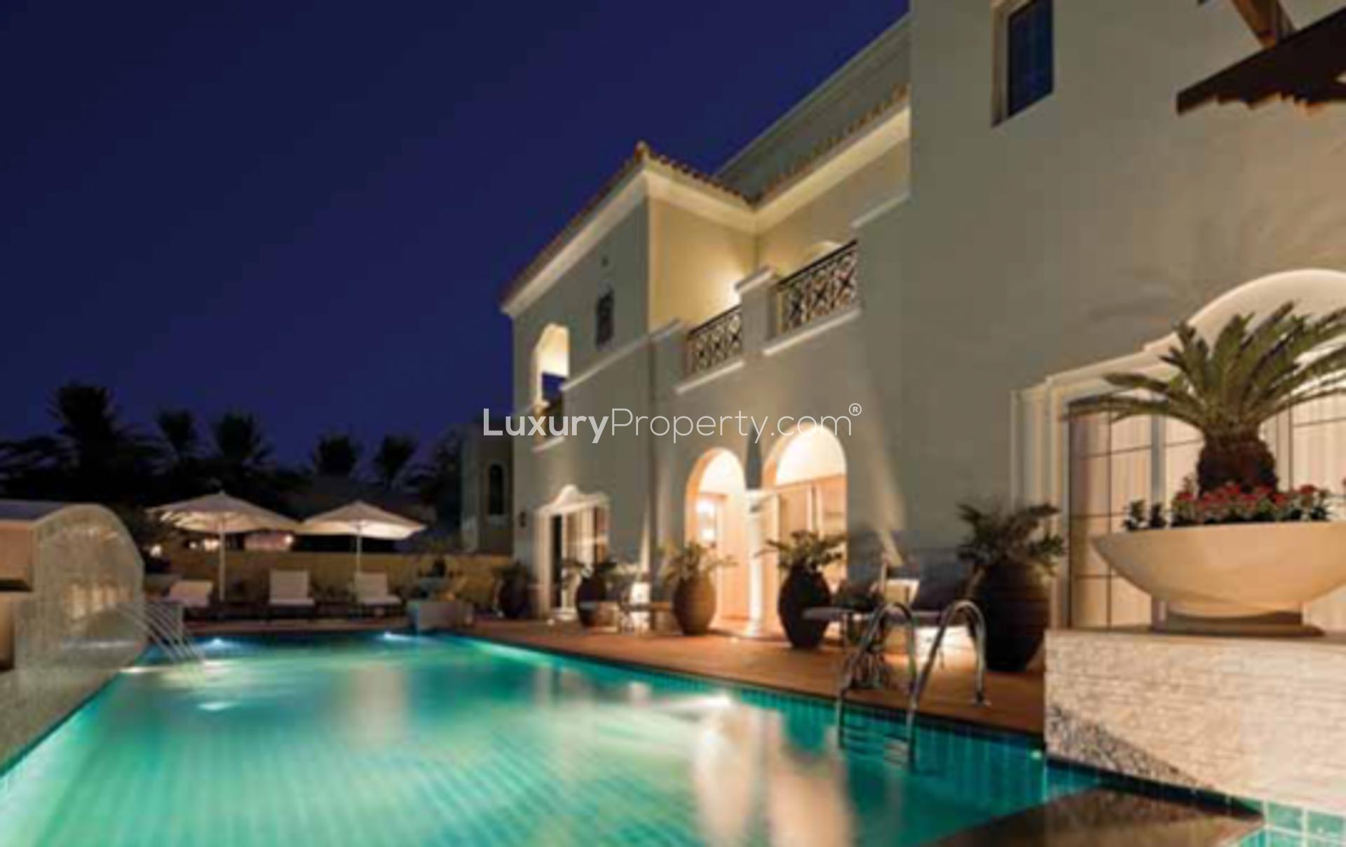 Opulent five-bedroom villa with pool in La Avenida 2, Arabian Ranches at night