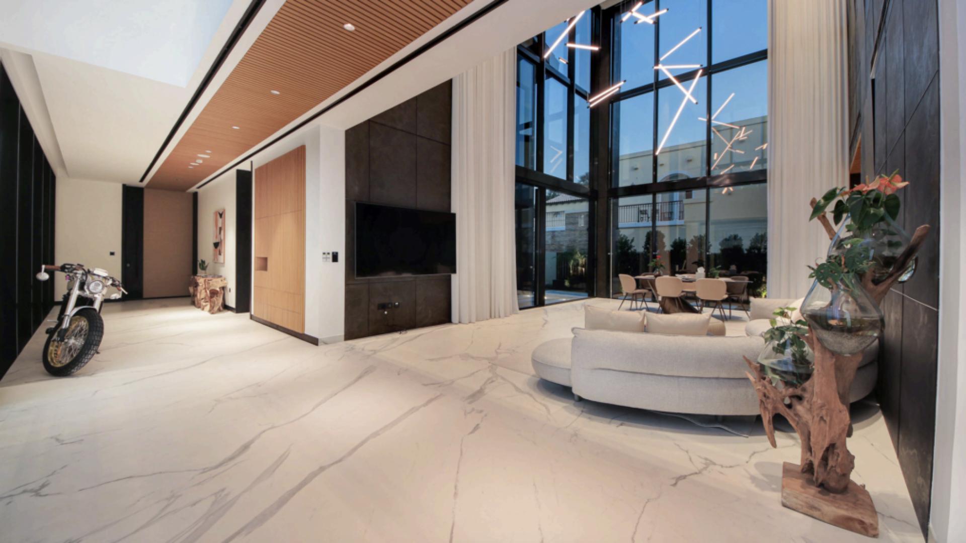 Luxurious living room in 5-bed villa, Sienna Lakes, Jumeirah Golf Estates, with modern decor