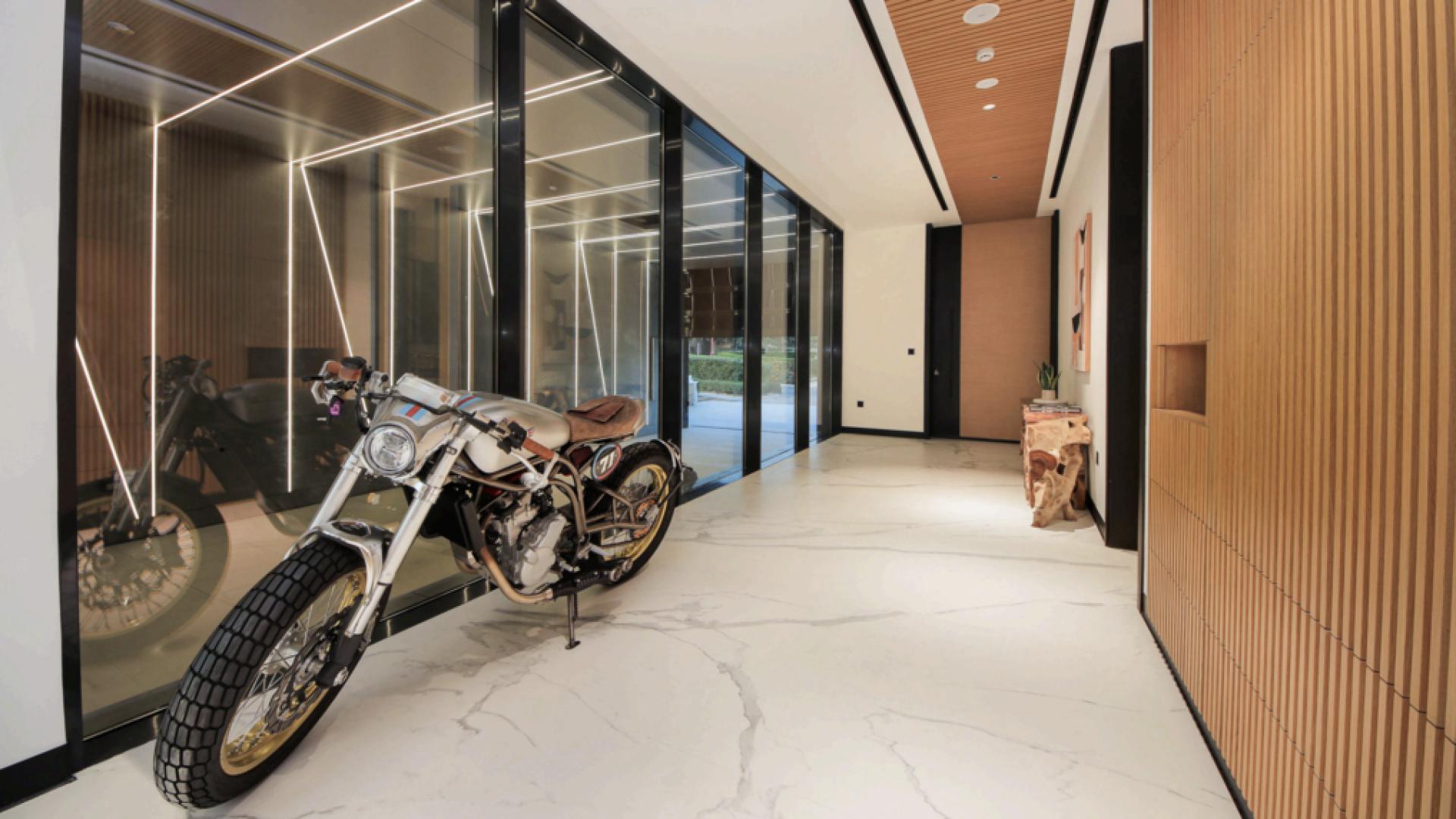 Modern 5-bedroom villa facade in Sienna Lakes, Jumeirah Golf Estates, with landscaped garden