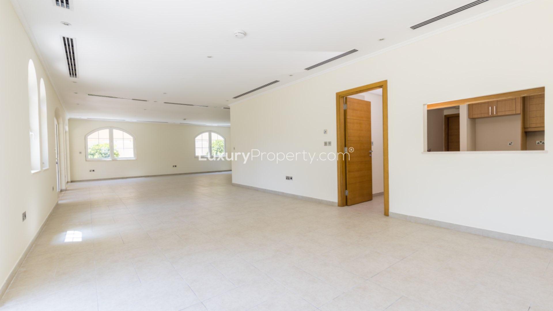 Spacious living room with garden view in Jumeirah Park Legacy villa for sale