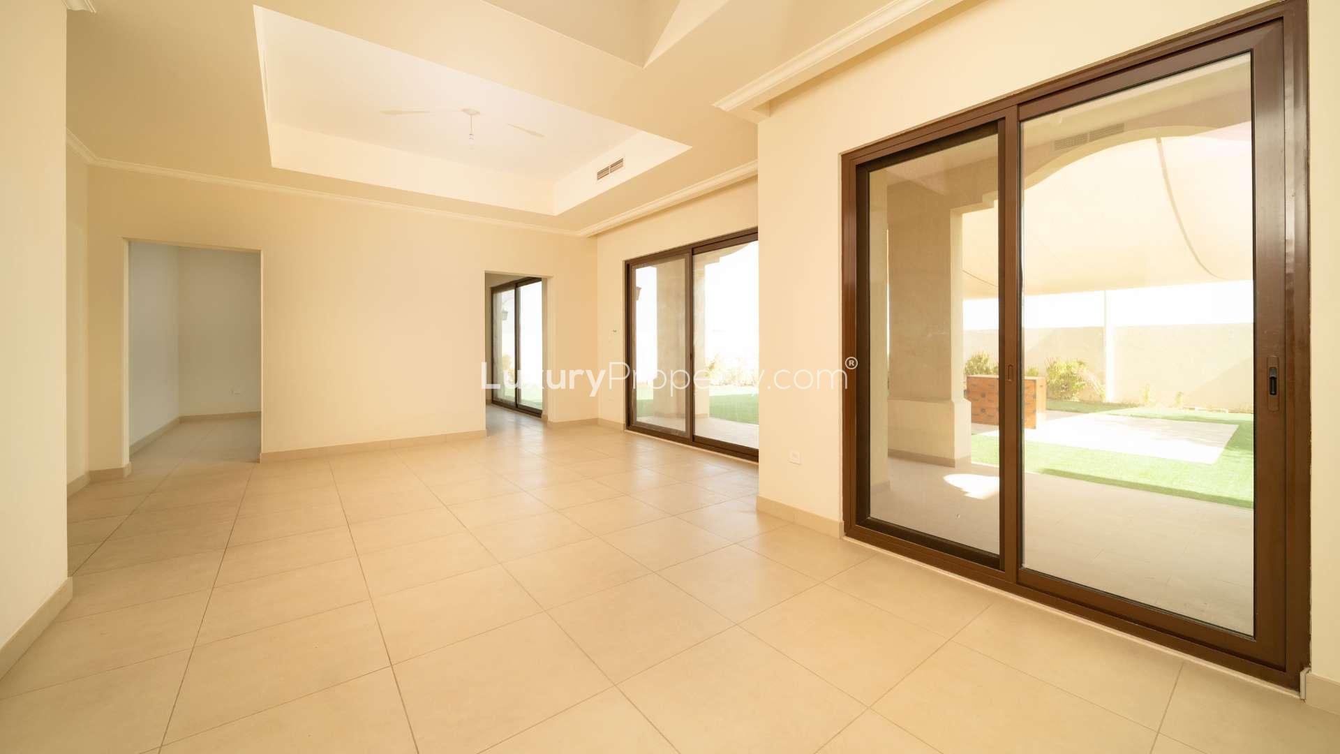 Spacious living room with large windows in Lila villa, Arabian Ranches 2 for sale