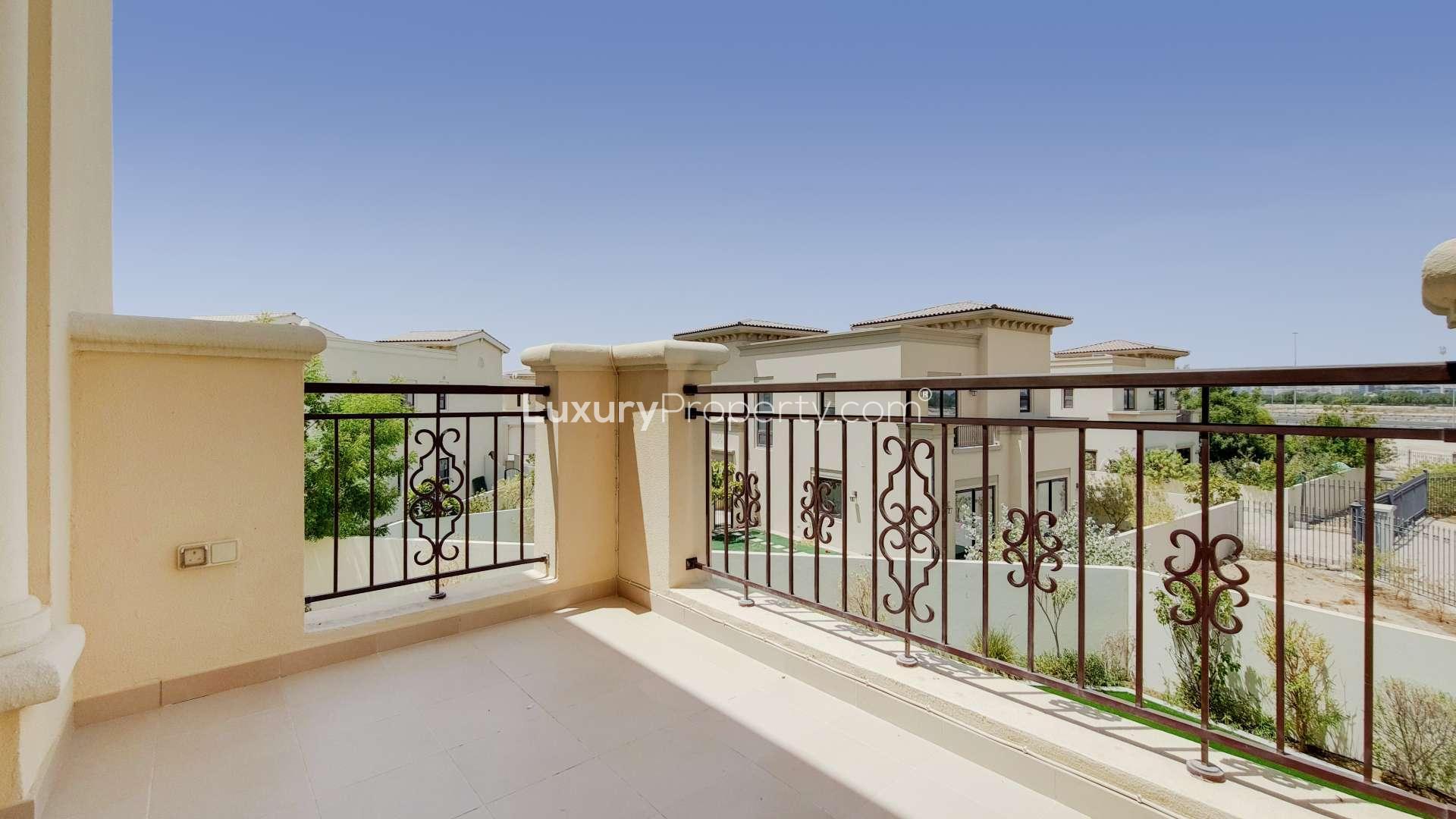 Spacious living area with large windows in Lila villa, Arabian Ranches 2