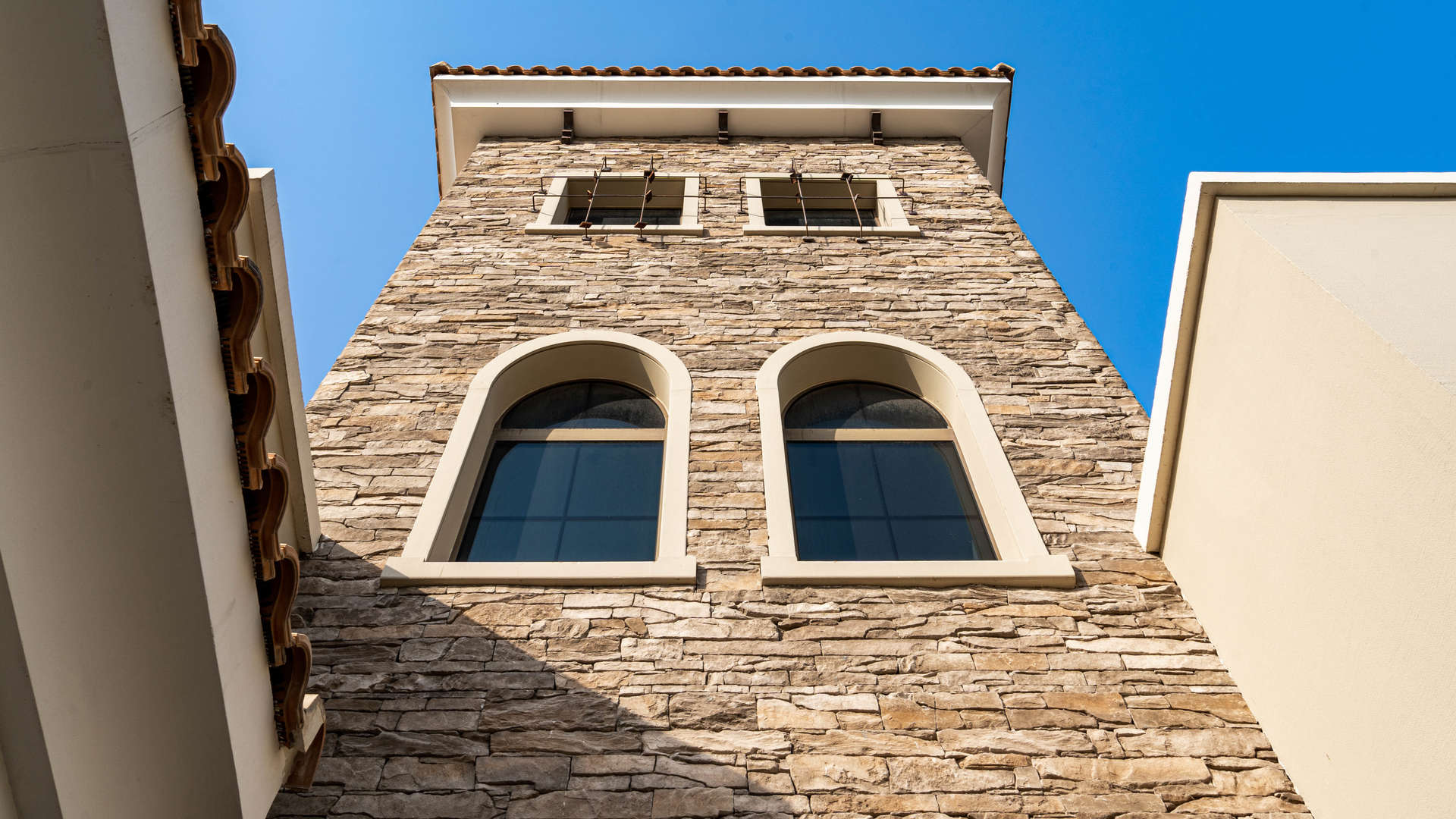 Stunning 5-bedroom villa exterior in Lime Tree Valley, Jumeirah Golf Estates, with lush greenery