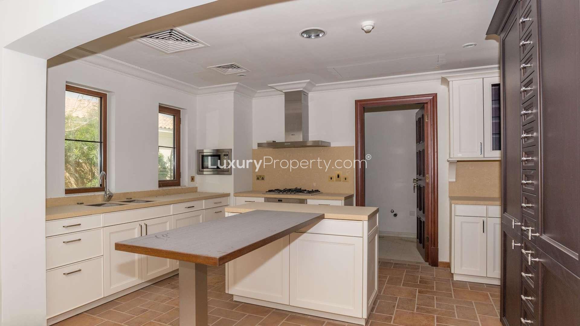 Luxury villa kitchen with modern design in Lime Tree Valley, Jumeirah Golf Estates