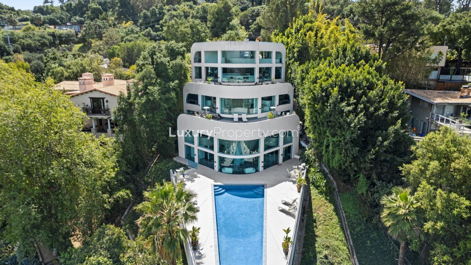 Luxurious Bel Air Yacht Mansion villa with pool, surrounded by lush greenery in Los Angeles