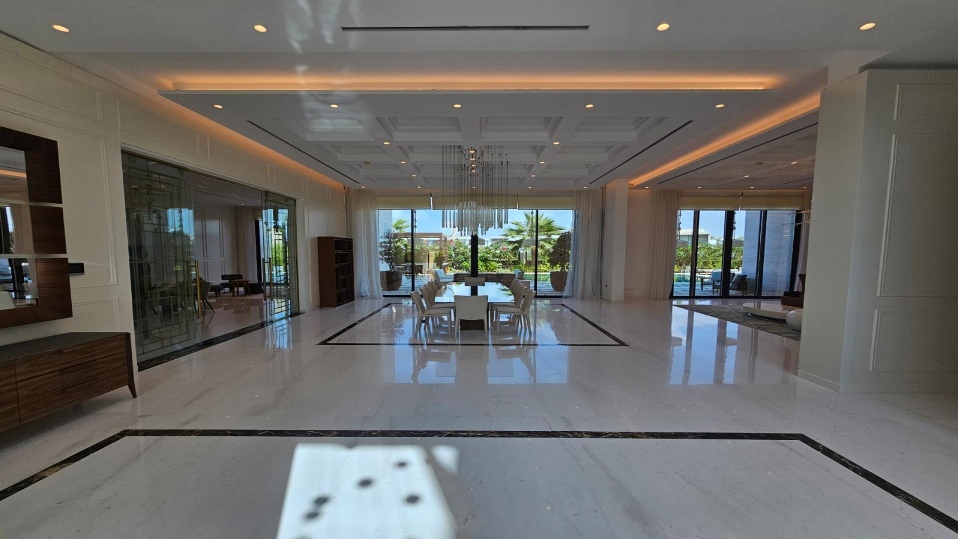 Luxurious villa poolside view in Dubai Hills Estate mansion for sale
