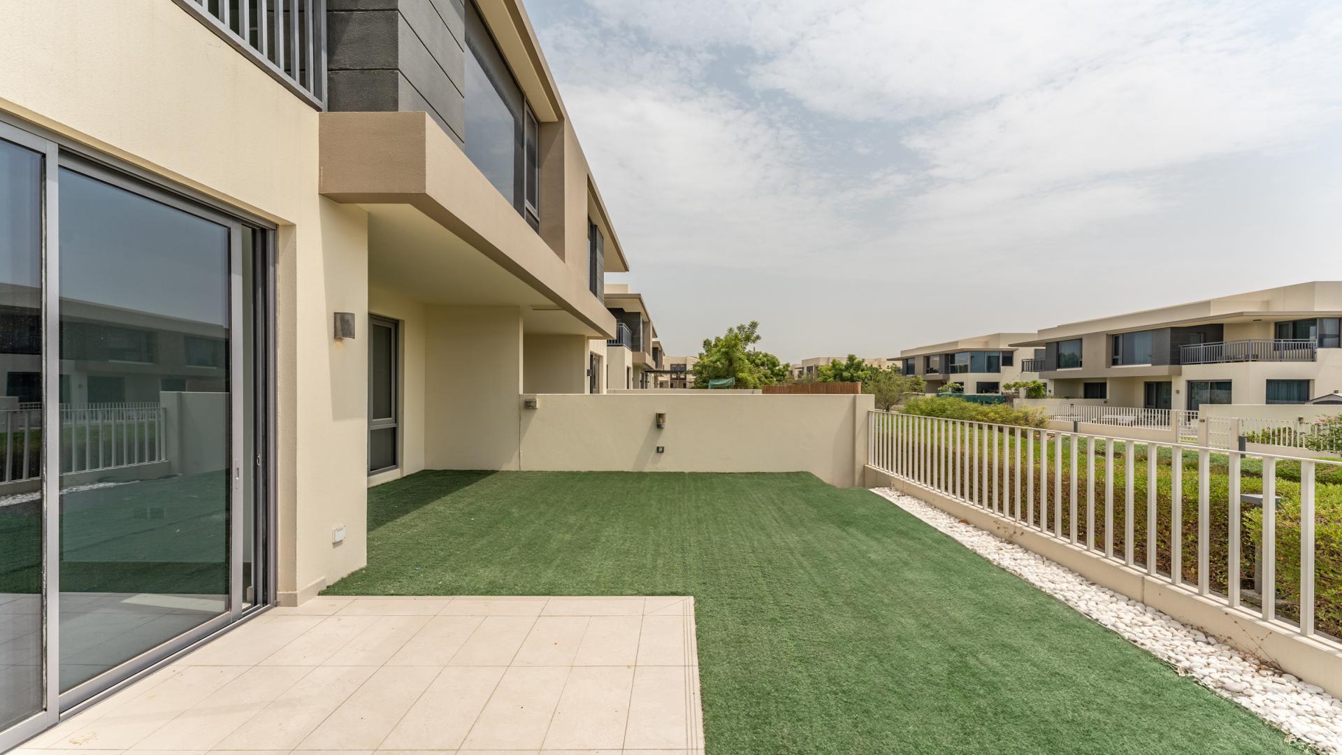 Modern villa exterior with garden, Dubai Hills Estate, Maple community, five bedrooms, for sale